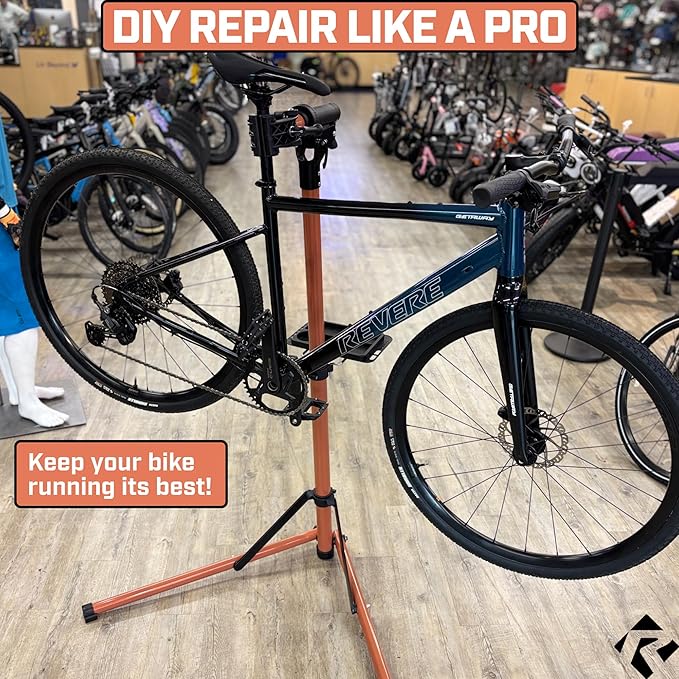 Revere Bike Repair Stand & Storage Bag, Telescoping Arm, Rotating Clamp, Magnetic Tool Tray, and Adjustable Handlebar Rod - Heavy Duty, Sturdy, Adjustable (Orange)